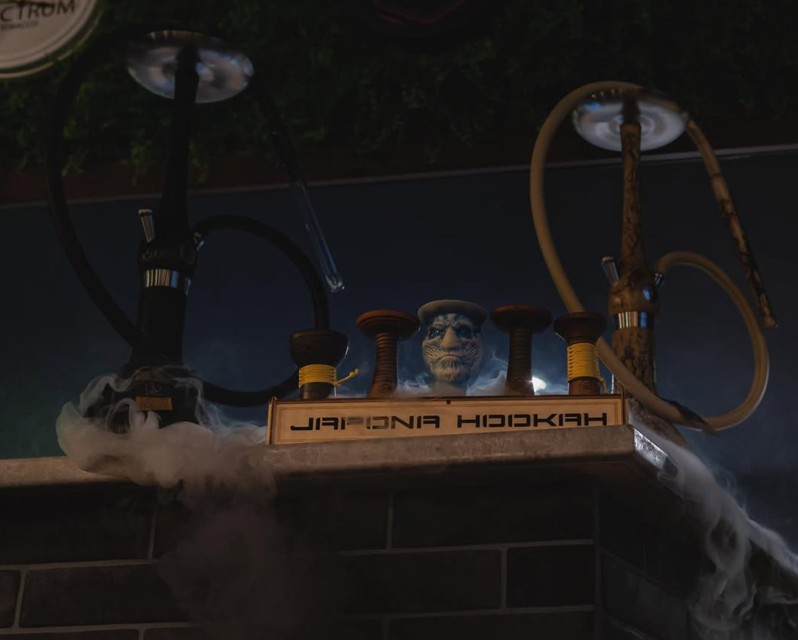 Hookahs wreathed in smoke